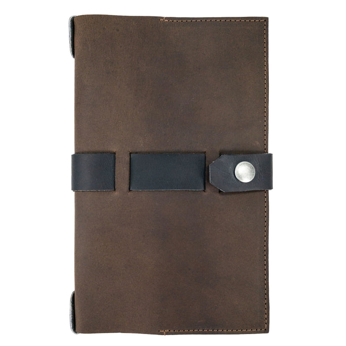 Elegant closure view of Hide & Drink's Riveted Field Note Cover for Moleskine (5 x 8.25 in.) Notebook NOT Included, crafted from premium brown leather. This artisan product showcases quality handmade techniques from La Antigua Guatemala & Oaxaca, Mexico.