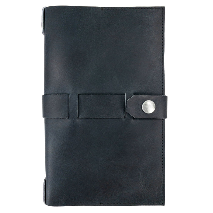 Detailed view of Hide & Drink's Riveted Field Note Cover for Moleskine (5 x 8.25 in.) Notebook NOT Included, showcasing its robust black full grain leather exterior. Perfect for writers on the go, made with artisan dedication in La Antigua Guatemala & Oaxaca, Mexico.