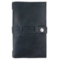Detailed view of Hide & Drink's Riveted Field Note Cover for Moleskine (5 x 8.25 in.) Notebook NOT Included, showcasing its robust black full grain leather exterior. Perfect for writers on the go, made with artisan dedication in La Antigua Guatemala & Oaxaca, Mexico.
