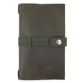 Interior view of Hide & Drink's Riveted Field Note Cover for Moleskine (5 x 8.25 in.) Notebook NOT Included, featuring a luxurious black leather lining. Perfect for protection and style, this cover is artisan-crafted in La Antigua Guatemala & Oaxaca, Mexico.