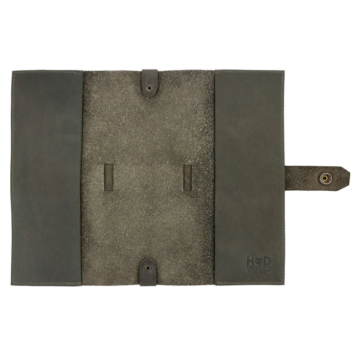 Side angle display of Hide & Drink's Riveted Field Note Cover for Moleskine (5 x 8.25 in.) Notebook NOT Included, highlighting its full grain leather quality and design features. An artistic creation, handmade in La Antigua Guatemala & Oaxaca, Mexico.