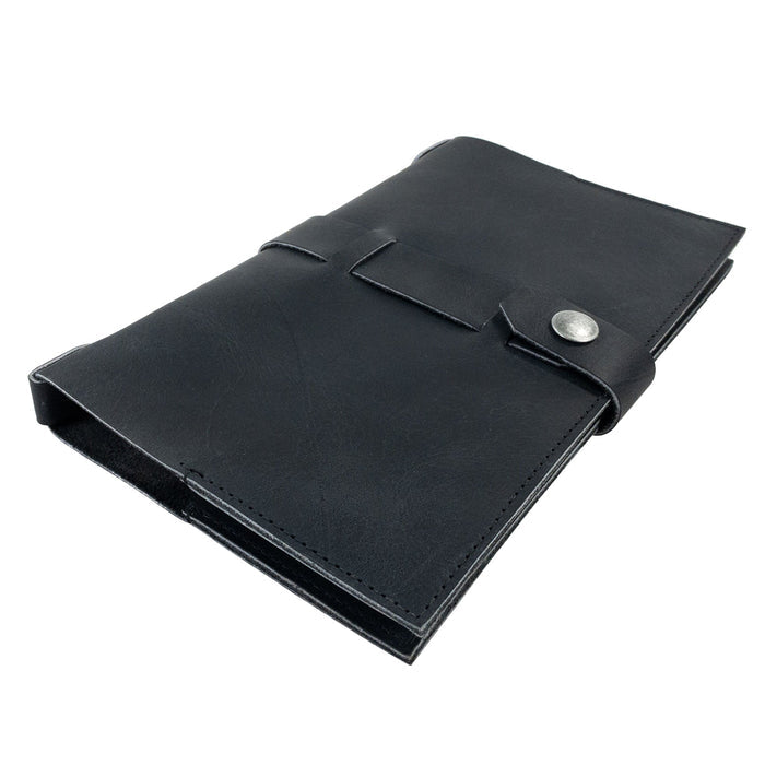 Aesthetic side perspective of Hide & Drink's Riveted Field Note Cover for Moleskine (5 x 8.25 in.) Notebook NOT Included in stunning black leather. A testament to artisan craftsmanship, this cover is handmade in La Antigua Guatemala & Oaxaca, Mexico.