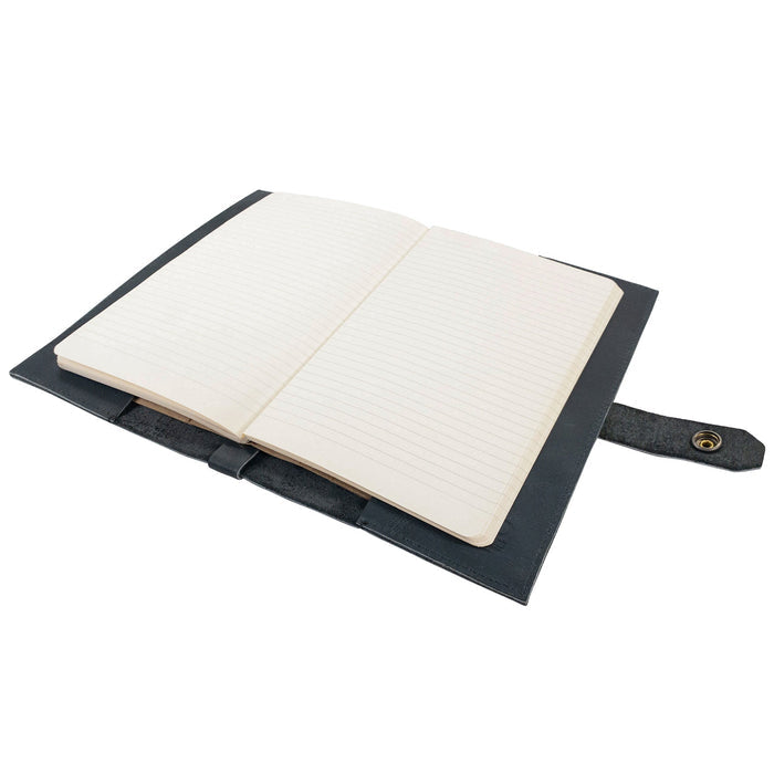 Open layout of Hide & Drink's Riveted Field Note Cover for Moleskine (5 x 8.25 in.) Notebook NOT Included, featuring ample lined pages for writing. This full grain leather cover reflects the quality of artisan design, handcrafted in La Antigua Guatemala & Oaxaca, Mexico.
