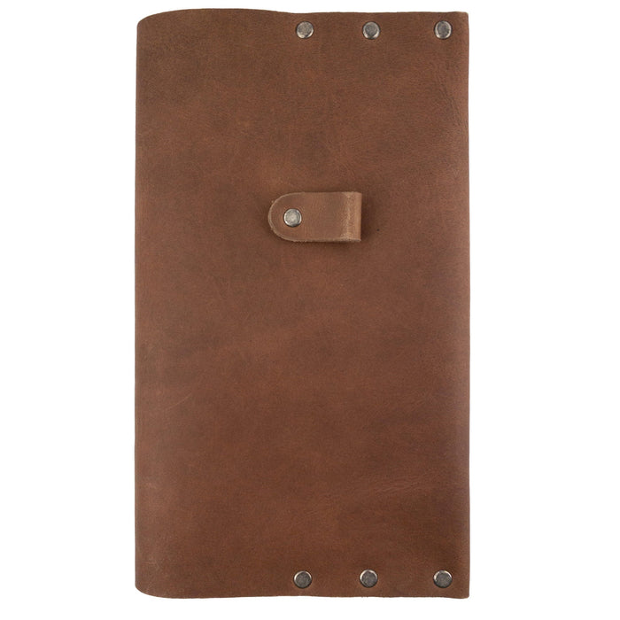 Front view of the Riveted Journal Cover (5 x 8.50 in.) by Hide & Drink. This classic sleeve in vintage style features full grain leather, showcasing the artisanal craftsmanship with hand cut and hand sewn details. Perfect for your notebook, this product embodies small batch production from La Antigua Guatemala & Oaxaca Mexico.