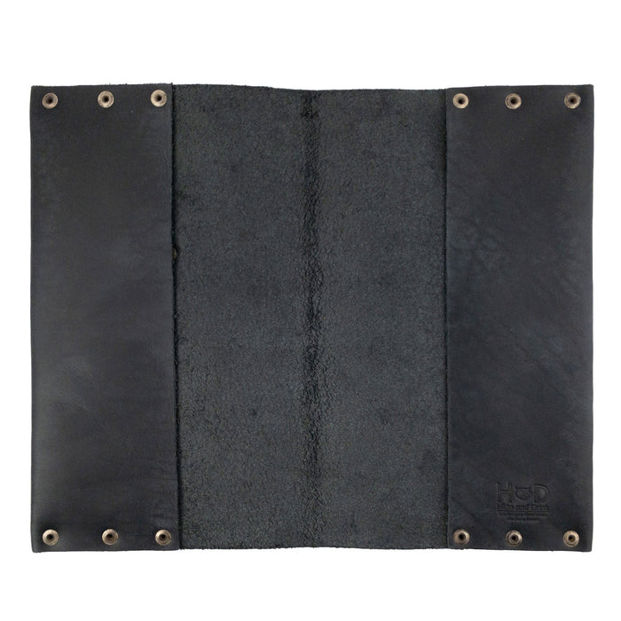 Detailed view of Hide & Drink's Riveted Journal Cover (5 x 8.50 in.), showing the soft interior finish of the full grain leather. This artisan-made cover is a perfect fit for your notebook and represents a fine example of handmade craftsmanship from La Antigua Guatemala. Discover the Riveted Journal Cover for Notebook (5 x 8.50 in.) (Notebook Not Included), a unique blend of classic sleeve style and durable materials.