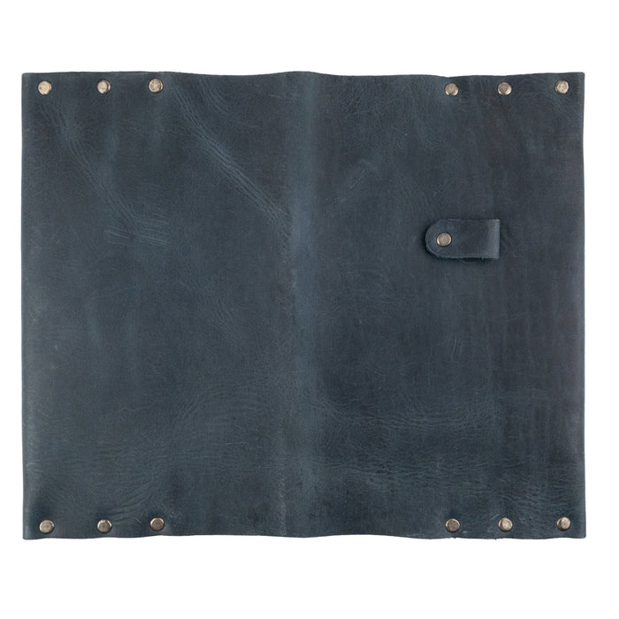 Back view of the Riveted Journal Cover (5 x 8.50 in.) from Hide & Drink, highlighting its elegant design made of full grain leather. Ideal for notebooks not included, this classic sleeve reflects the artistic skills from small batch production, handmade in La Antigua Guatemala & Oaxaca Mexico.