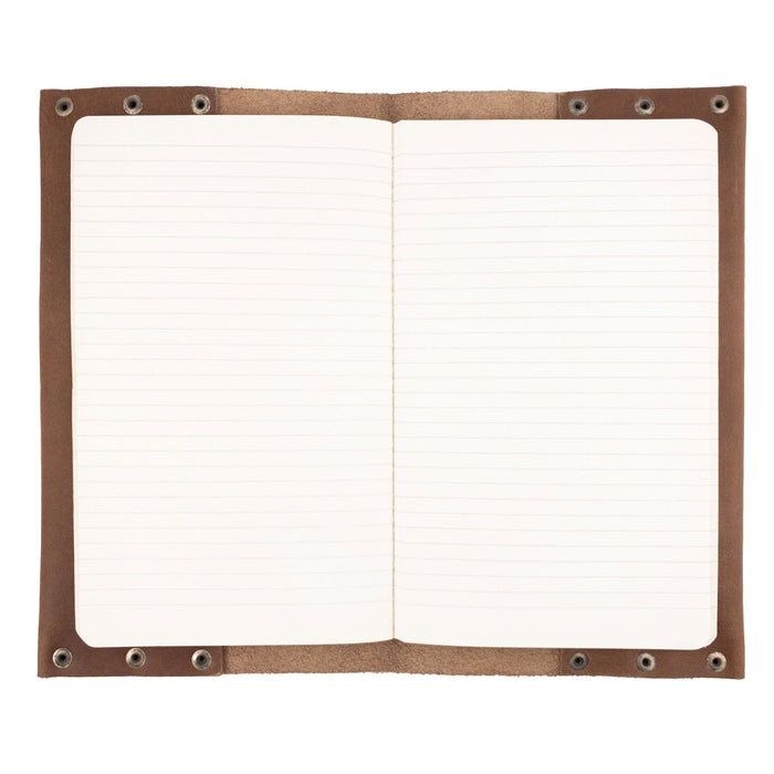 Interior view of the Riveted Journal Cover (5 x 8.50 in.) by Hide & Drink featuring lined pages. This full grain leather journal cover represents classic vintage style hand crafted by skilled artisans from La Antigua Guatemala & Oaxaca Mexico, designed for an optimal writing experience.