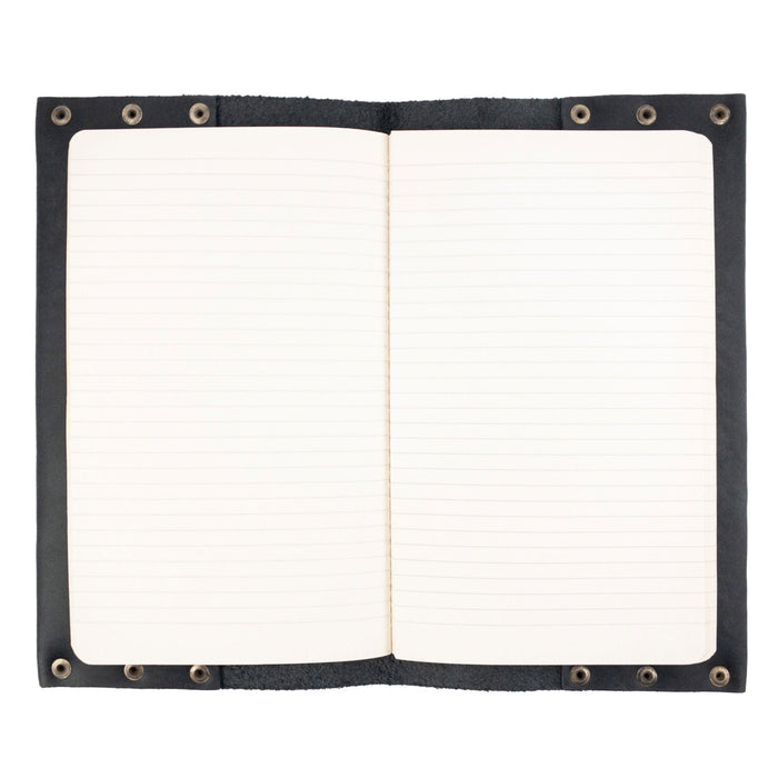 Open view of the Riveted Journal Cover (5 x 8.50 in.) by Hide & Drink, showcasing its classic sleeve design made of full grain leather, ideal for notebooks not included. This artisan piece features a vintage style that highlights small batch production and hand cut craftsmanship, made in La Antigua Guatemala & Oaxaca Mexico.