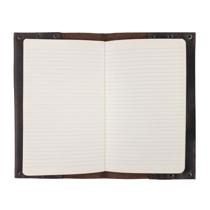 Interior view of Hide & Drink's Riveted Journal Cover (5 x 8.50 in.) (Notebook Not Included), featuring lined pages and a vintage style design in full grain leather. This handmade artisan item is meticulously hand cut and hand sewn, showcasing small batch production methods and fire branding, proudly crafted by skilled artisans in La Antigua Guatemala & Oaxaca Mexico.