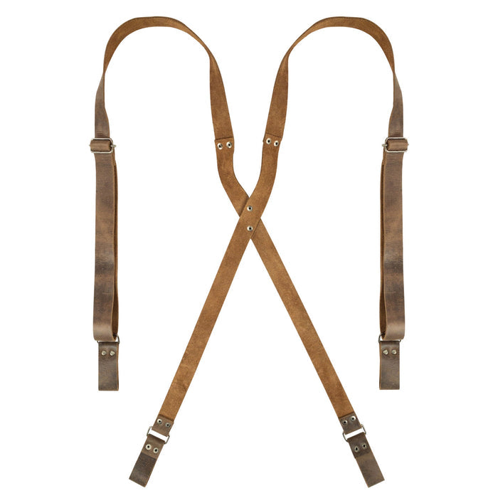 Riveted X Back Suspenders with Belt Loops by Hide & Groom showcase a durable heavy-duty leather design, perfect for weddings and steampunk events. This artisan-crafted piece is handmade in La Antigua Guatemala using full grain leather, featuring small batch production and fire branded details.
