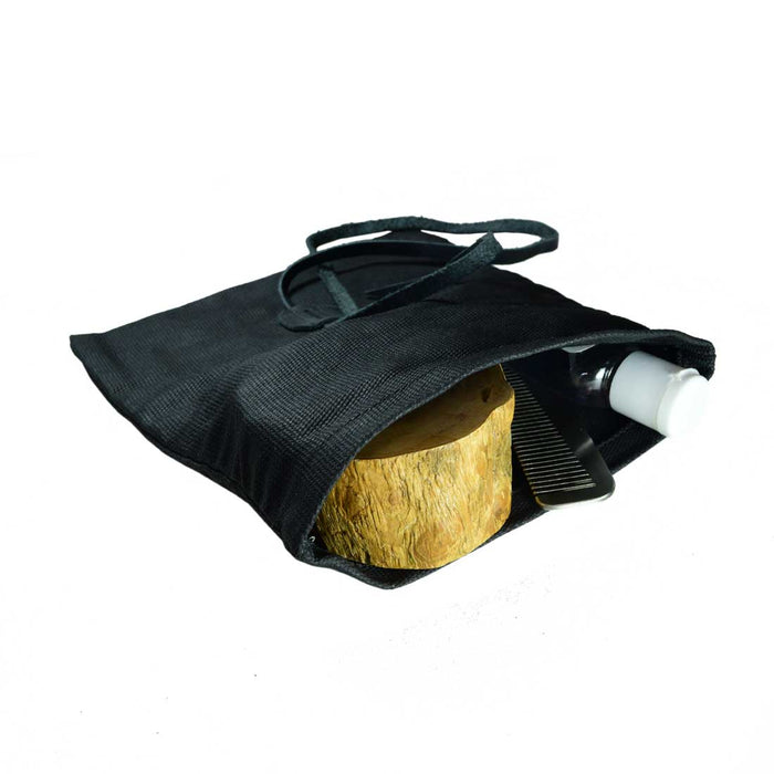 Discover the Rolling Pouch by Hide & Drink, a stylish Survival Roll Top Pouch made from durable Waxed Canvas & Full Grain Leather. Perfect as a lightweight case for your classic traveling & camping essentials, handcrafted in La Antigua Guatemala & Oaxaca, Mexico.