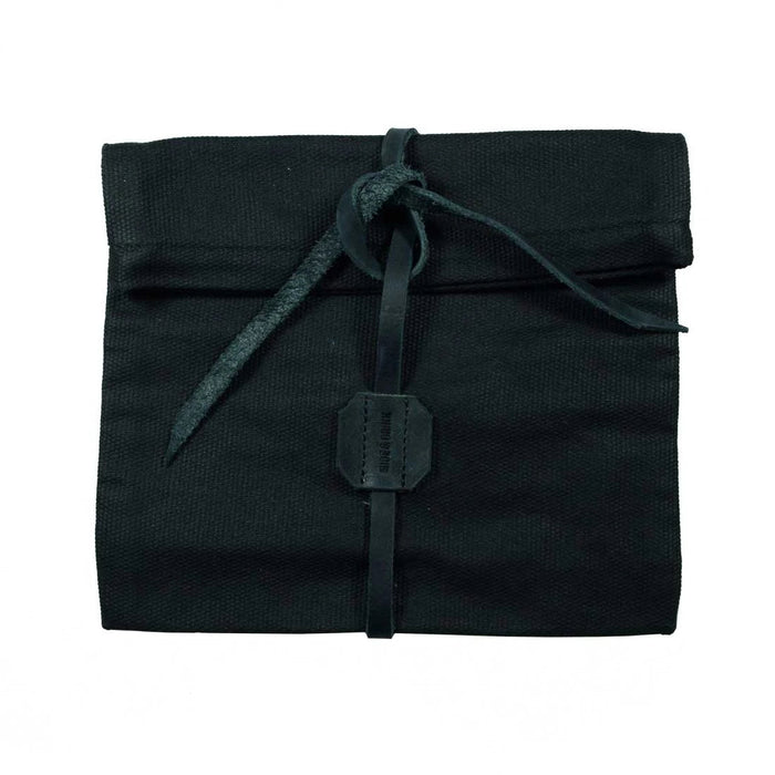 Explore Hide & Drink's Rolling Pouch, a chic Survival Roll Top Pouch made from robust Waxed Canvas & Full Grain Leather. Ideal as a lightweight case for your outdoor accessories, this artisan piece is crafted in La Antigua Guatemala & Oaxaca, Mexico.