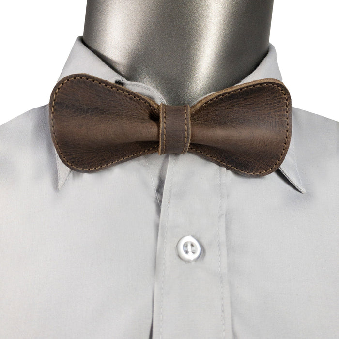 Rounded Bow Tie for Groomsmen by Hide & Groom shown on a mannequin wearing a shirt, showcasing the elegant and sophisticated design ideal for weddings and formal events. Crafted from durable full grain leather, this handmade accessory highlights artisan craftsmanship.
