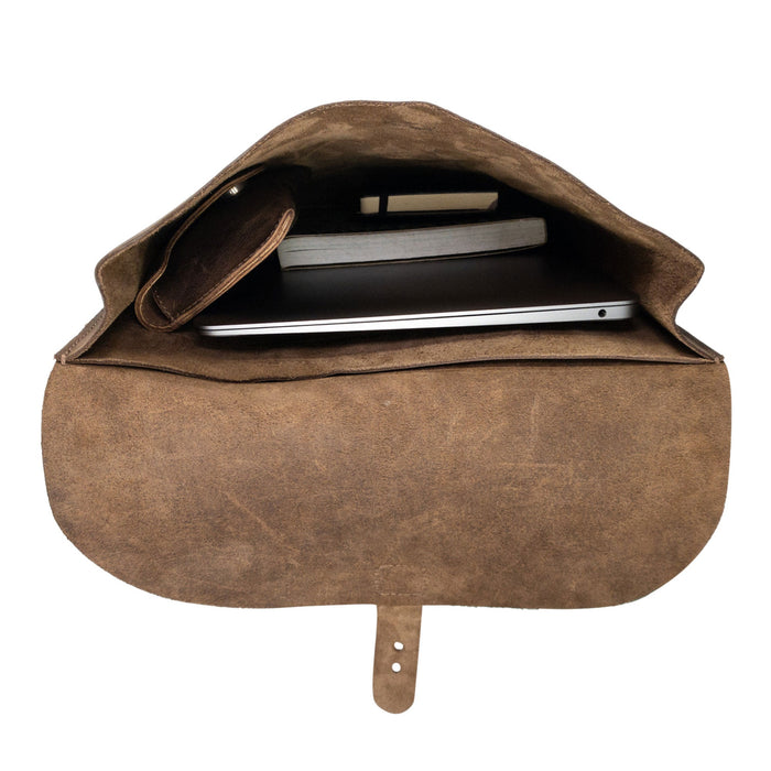 Interior view of Hide & Drink's Rounded Laptop Backpack with Adjustable Straps. The spacious compartment highlights this full grain leather design as an excellent portable case and travel accessory. Hand cut and hand sewn in La Antigua Guatemala & Oaxaca Mexico, perfect for tech enthusiasts.