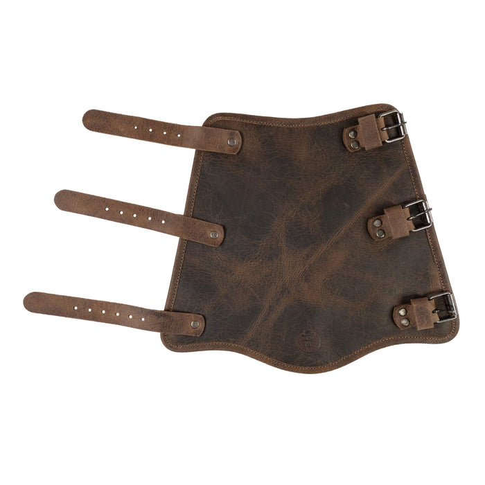 Flat lay of the Rustic Archery Bracer from Valhalla Gear, showing its adjustable straps and full grain leather material. This wrist guard is perfect for knights and cosplay, reflecting a commitment to artisan craftsmanship through small batch production, handmade in La Antigua Guatemala & Oaxaca Mexico.