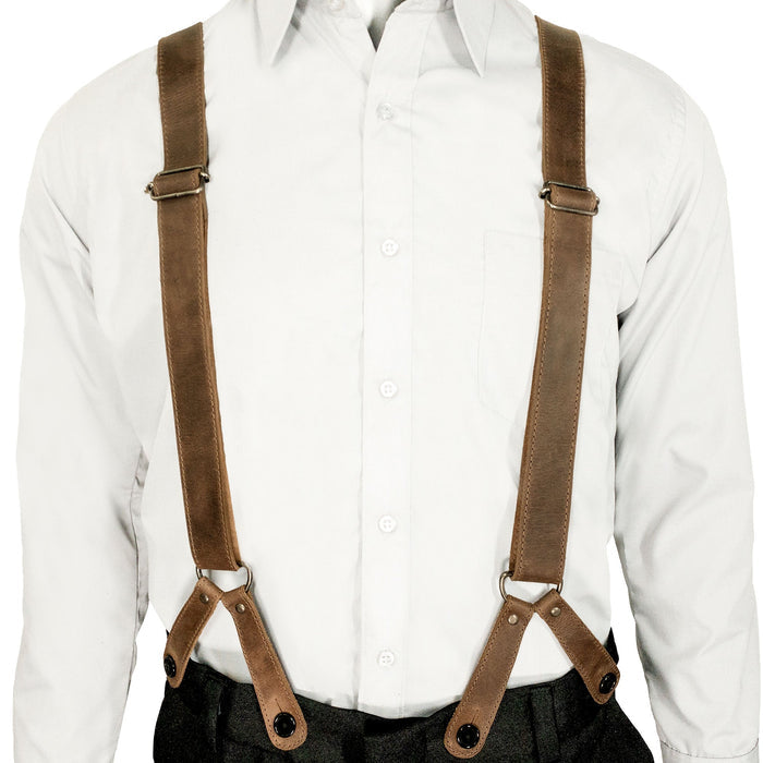Model wearing Rustic Button End Suspenders by Hide & Groom, ideal for adding style to wedding attire. Made of full grain leather, these suspenders are perfect for groomsmen, best men, bachelors, and are ideal for wedding ceremonies and dinner parties. Artisan craftsmanship with small batch production in La Antigua Guatemala & Oaxaca Mexico.