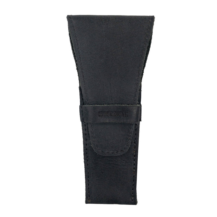 A sleek black Safety Razor Case by Hide & Drink made from full grain leather, perfect for organizing shaving accessories. This artisan-crafted case is a quality product handmade in La Antigua Guatemala and Oaxaca Mexico, reflecting small batch production.