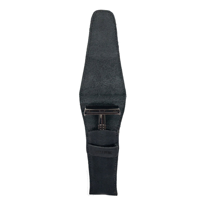 An inside view of the black Safety Razor Case by Hide & Drink, designed to hold razors carefully. Made with artisan skills from full grain leather, this case is ideal for personal care and shaving accessories, handmade in La Antigua Guatemala and Oaxaca Mexico.
