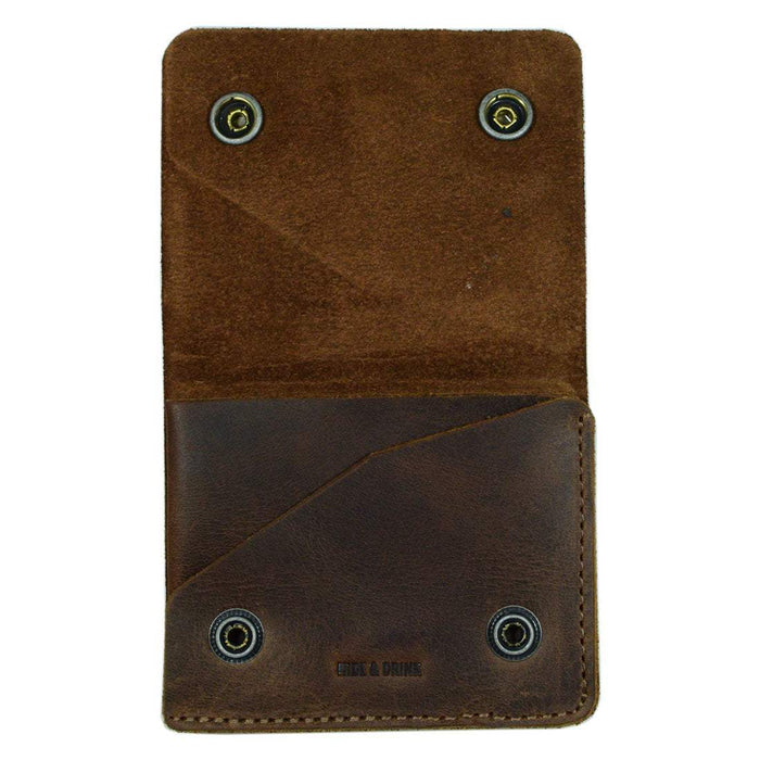 The back view of the Hide & Drink Sandwich Card Holder, designed with practicality in mind. This Double Snap Card Holder offers space for 4 cards while keeping the style intact. Made of Full Grain Leather, this coin case and cash organizer is fire branded and handmade in La Antigua Guatemala & Oaxaca Mexico.