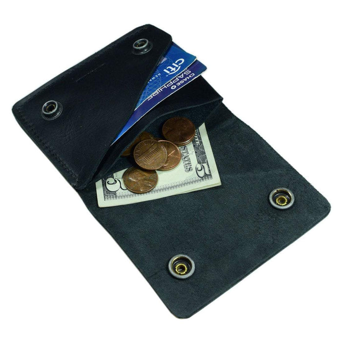 An interior shot of the Hide & Drink Sandwich Card Holder to emphasize its functionality. This Double Snap Card Holder can store up to 4 cards while maintaining a sleek look. Made of Full Grain Leather, it's an ideal cash organizer and coin case, designed with a focus on small batch artisan production.