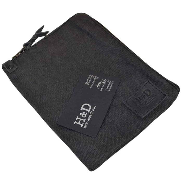 Front view of the navy Scribbler Case from Hide & Drink, crafted from Waxed Canvas. Ideal for notebooks, showcasing small batch production and artisan quality. Handmade in La Antigua Guatemala & Oaxaca Mexico.
