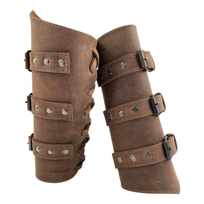 Two Valhalla Gear Set of 2 Archery Buckle Bracers displayed side by side, showcasing symmetrical design and craftsmanship. These armbands are ideal hand protectors for bow shooting practice, featuring artisan hand-stitched details and durable leather.