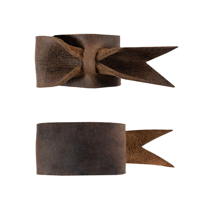 Refined Set of 4 Napkin Rings for Weddings by Hide & Groom, featuring a side view of leather napkin rings showcasing an elegant open bow style. Perfect for adding a decorative touch to wedding receptions and dinner parties, made from full grain leather with artisan handmade quality from La Antigua Guatemala & Oaxaca Mexico.