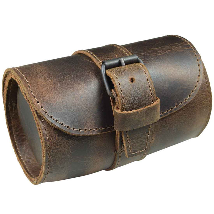 Side view of the Hide & Drink Single Watch Case, elegantly secured. This Cylinder Watch Case with Cushion offers thoughtful jewelry organization and travel convenience, designed with durable Full Grain Leather. Artisan-made in La Antigua Guatemala & Oaxaca Mexico, demonstrating the integrity of hand cut and hand sewn craftsmanship.