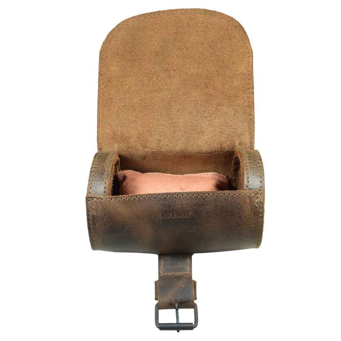 Open view of the Hide & Drink Single Watch Case, ready to store your timepiece. This Cylinder Watch Case with Cushion is an essential jewelry organizer and travel accessory, made from rich Full Grain Leather. Handcrafted in La Antigua Guatemala & Oaxaca Mexico, highlighting small batch production and genuine artisan care.
