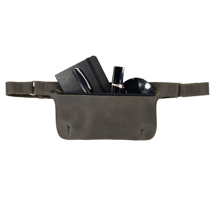 Slim Fanny Pack by Hide & Drink showcased in a practical setting, perfect for on-the-go with phone and keys visible. This artisan-crafted fanny pack is made from high-quality full grain leather, ideal for daily use.