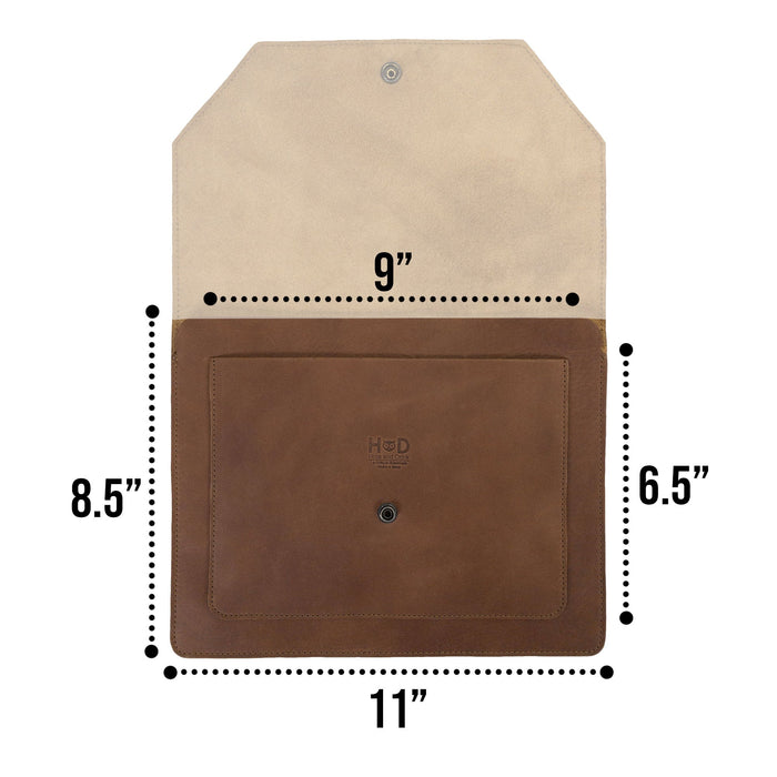 Hide & Drink's Slim Portfolio in blue, highlighting the elegance of this handmade Flat Messenger Case. Made from Full Grain Leather, this Narrow Document Holder is an ideal office accessory crafted in La Antigua Guatemala & Oaxaca Mexico.
