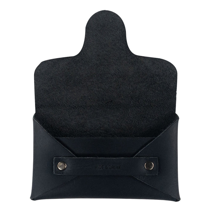 The interior view of a Snapless Business Card Holder by Hide & Drink, showcasing its practical design with a smooth lining. This vintage wallet is perfect for men and women, made from resilient Full Grain Leather, serving as a sturdy pouch and money organizer crafted with care, hand cut and sewn in La Antigua Guatemala and Oaxaca Mexico.