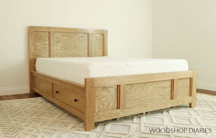 Finished DIY storage bed with mattress showing side drawer storage