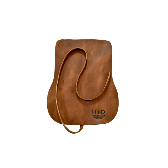 Hide & Drink Leather Sunglass Wrap is a chic and stylish solution for storing sunglasses. Made from full grain leather, it serves as an excellent eye glasses storage option for travel. Artisan crafted and hand sewn, it represents the quality of small batch production.