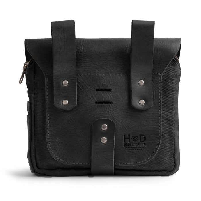 Front view of the Survival Camping Pouch by Hide & Drink highlighting its quality craftsmanship with Water Resistant Waxed Canvas & Full Grain Leather. Perfect for a survival kit, this artisan-made bag is ideal for outdoor essentials.