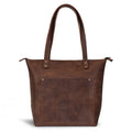 The Juniper Zippered Tote Bag showcases a stylish design in full grain leather, inspired by Austin’s bold passion and vibrant popular culture. Made with artisan craftsmanship in La Antigua Guatemala and Oaxaca Mexico, this bag features a clean look perfect for everyday use.