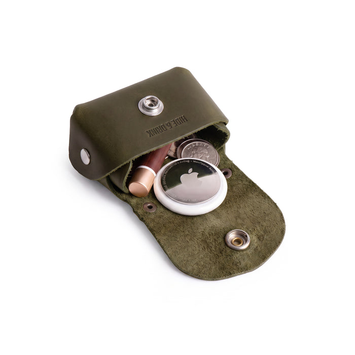 Front view of the Tiny Handbag Keychain by Hide & Drink, designed as a Tiny Handbag with Key Ring Holder featuring durable Full Grain Leather. This unique item is part of Small Batch Production, Hand Cut, Hand Sewn, and Fire Branded, showcasing the artistry of being Handmade in La Antigua Guatemala & Oaxaca Mexico.