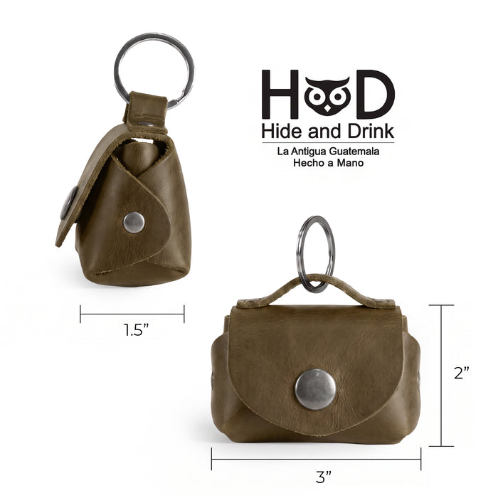 Close-up of the Tiny Handbag Keychain by Hide & Drink, showcasing the measurements of the Tiny Handbag with Key Ring Holder made from Full Grain Leather. This stylish piece is part of Small Batch Production, is Hand Cut, Hand Sewn, and Fire Branded, and is proudly Handmade in La Antigua Guatemala & Oaxaca Mexico.