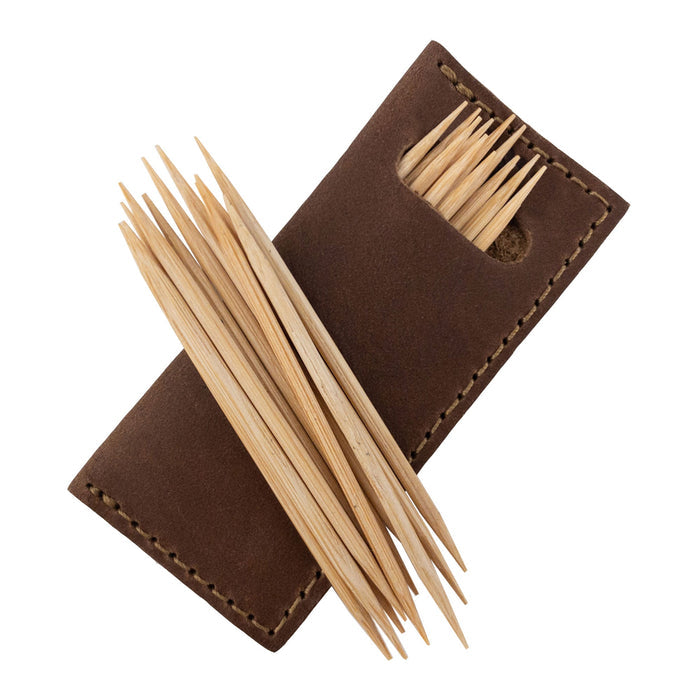 Hide & Drink Tooth Pick Case (4 Pack) with a close-up view of a leather toothpick holder made from quality material. Set of 4 Tooth Pick Cases, Cooking Accessories, Full Grain Leather, StockyardX, Small Batch Production, Hand Cut, Hand Sewn, Fire Branded, Artisan, Handmade in La Antigua Guatemala & Oaxaca Mexico.