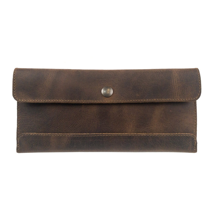 Hide & Drink's Travel Hand Wallet made of Full Grain Leather, showcasing a rustic design, perfect as a Travel Wallet. This artisan-crafted wallet is part of Small Batch Production, meticulously hand cut, and hand sewn in La Antigua Guatemala & Oaxaca Mexico.
