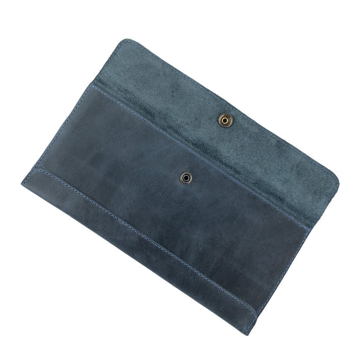 Open view of Hide & Drink's navy blue Travel Hand Wallet, highlighting its organized compartments, crafted with Full Grain Leather. This Travel Wallet showcases artisan craftsmanship made in La Antigua Guatemala & Oaxaca Mexico.