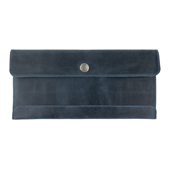Hide & Drink's navy blue Travel Hand Wallet filled with cash and cards, demonstrating its practicality and style in Full Grain Leather. This Travel Wallet is handmade with love in La Antigua Guatemala & Oaxaca Mexico.