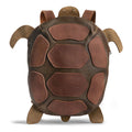 A stylish Turtle-Shaped Backpack by Hide & Play, featuring a unique design perfect for casual outings. This versatile bag can be used as a Casual Bag, Messenger Bag, or Travel Bag for Men and Women. Made from Full Grain Leather, it showcases the quality of StockyardX's Small Batch Production with hand cut and hand sewn details, proudly handcrafted in La Antigua Guatemala.