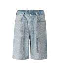 A pair of undeveloped azul denim shorts decorated with sparkling rhinestones for a stylish look