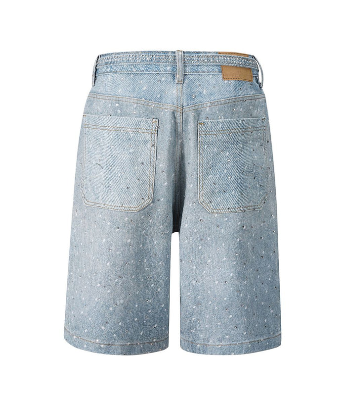A pair of undeveloped azul rhinestone denim shorts with intricate rhinestone embellishments and distressed details, perfect for stylish casual wear