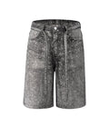 Luxury black denim shorts featuring all-over hand-embellished rhinestones, a baggy fit, and a removable rhinestone belt for versatile styling