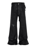 Heavyweight black denim jeans with wide flare legs and patchwork rear detailing