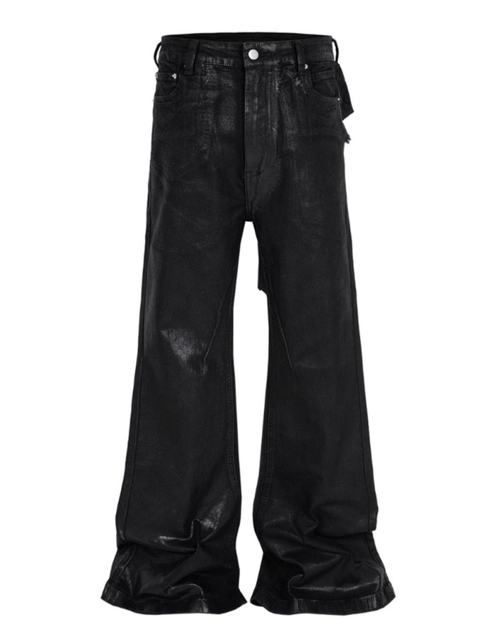 Heavyweight black denim jeans with wide flare legs and patchwork rear detailing