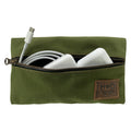 Hide & Drink Utility Cord Pouch presented in a warm tone, reflecting its artisanal roots. This pouch serves as an all-purpose utility & charger case for MacBook, iPad & Laptop and beautifully doubles as a cable organizer, handcrafted in La Antigua Guatemala & Oaxaca Mexico.