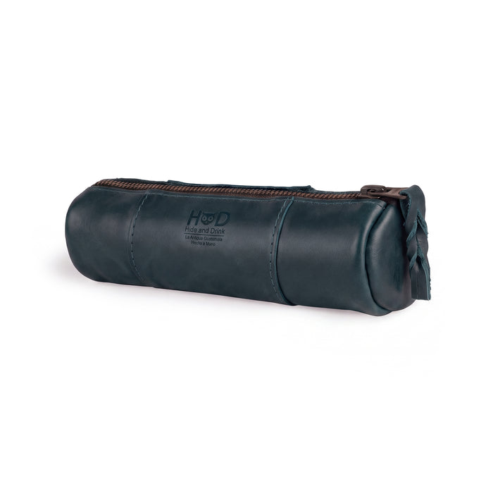 Utility Cylinder Case by Hide & Drink made from navy leather, combining rustic charm with modern functionality. Ideal for office supplies or personal items, this handmade bag is crafted from Full Grain Leather. Cylinder Case, Handmade, Classic Bag.
